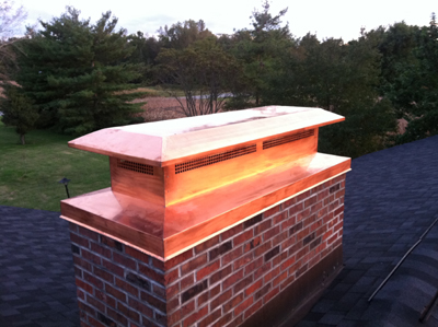 Before and after chimney cap replacement in Hampton Bays, NY