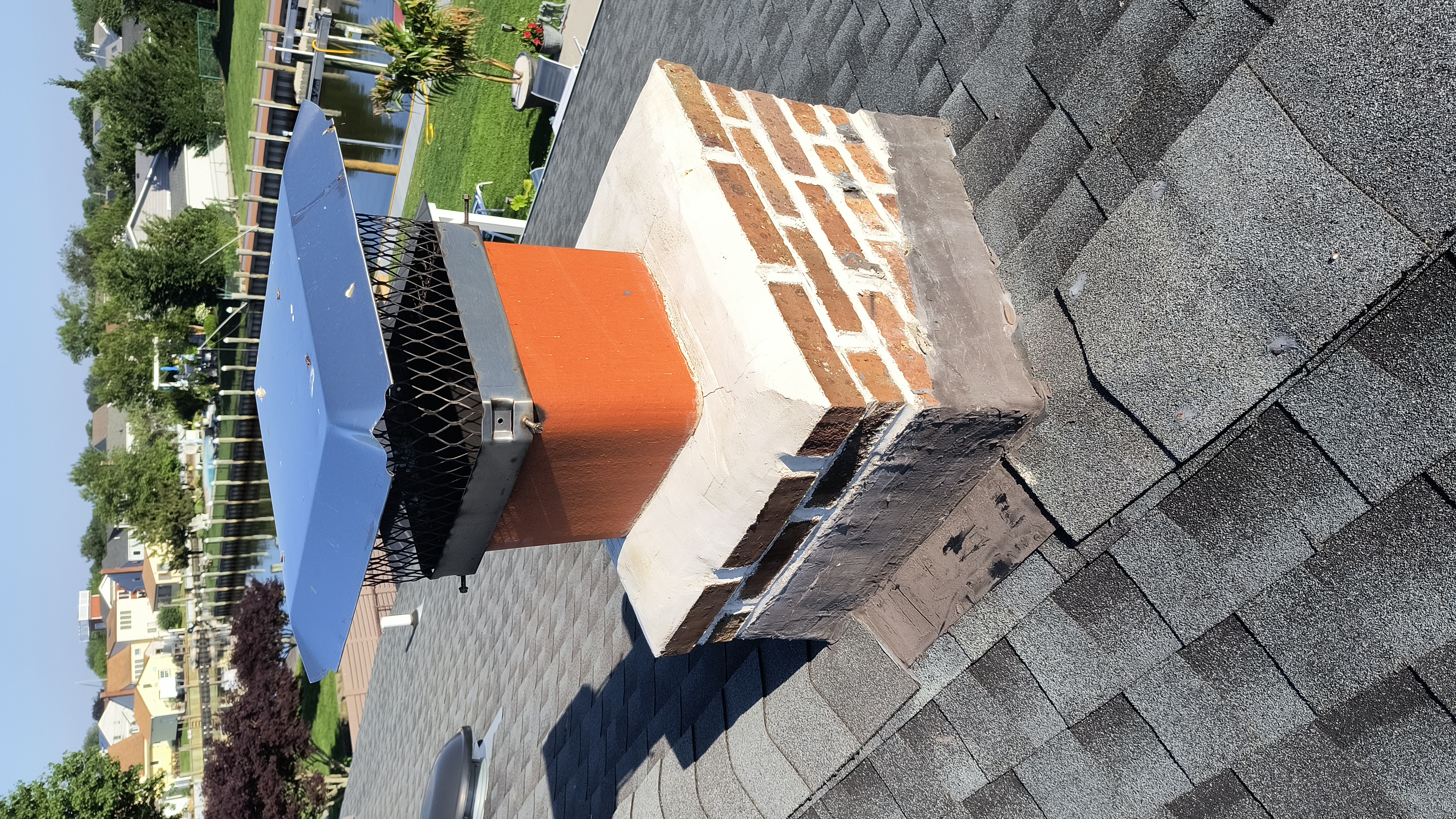 Full chimney masonry rebuild and restoration in Hampton Bays, NY