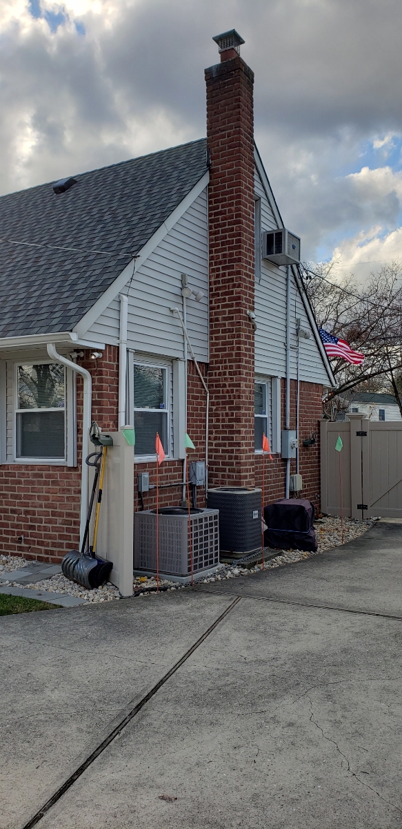 Professional chimney repointing restoring brick joints in Hampton Bays, NY